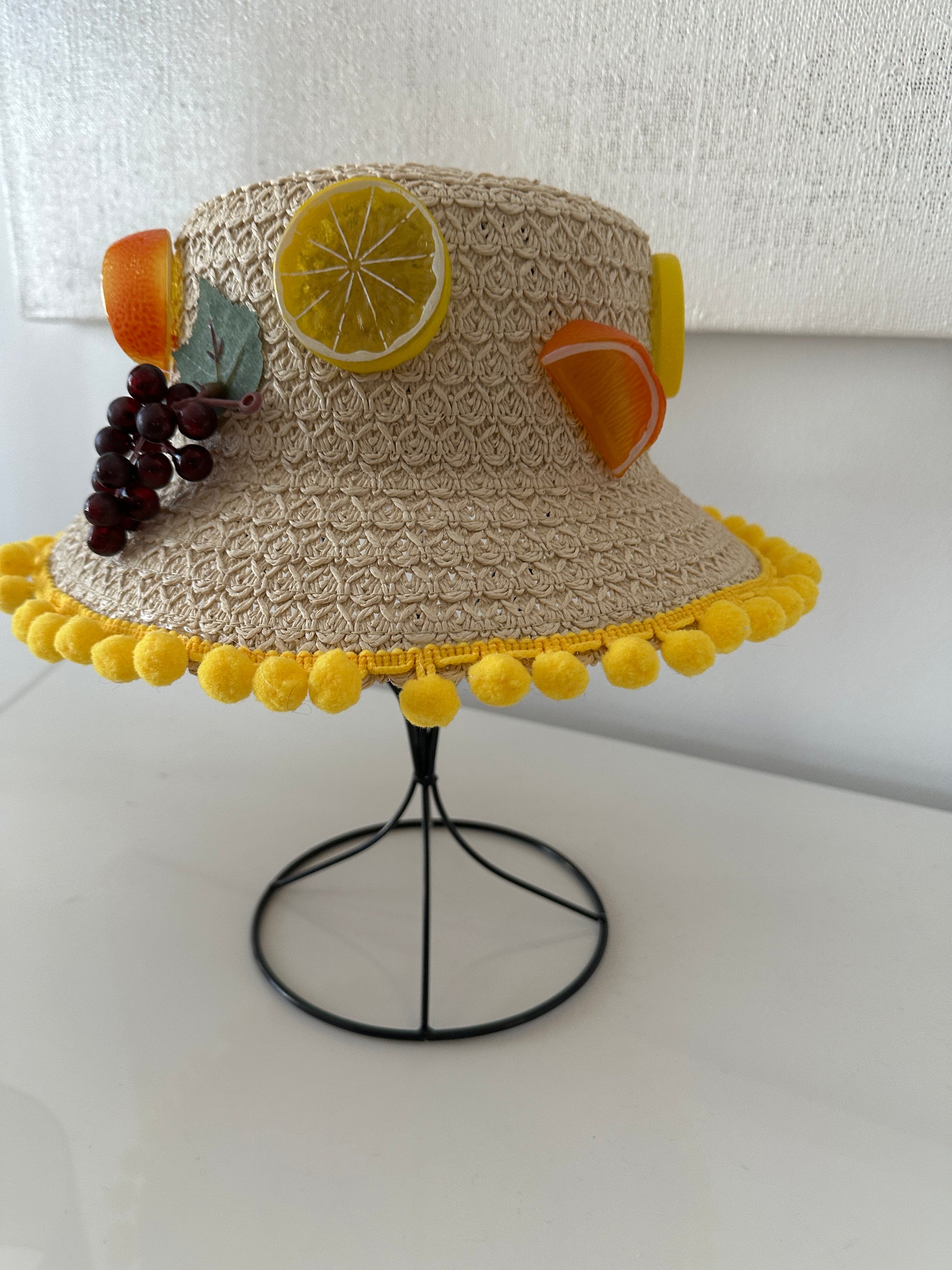 Decorative glass with fruit design on a white background